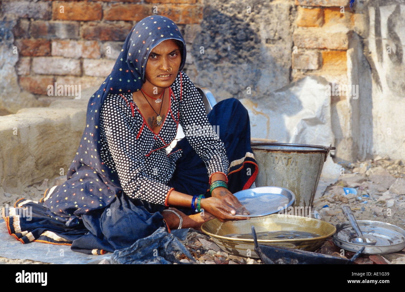 indian women at the houswork, India, Uttar Pradesh Stock Photo