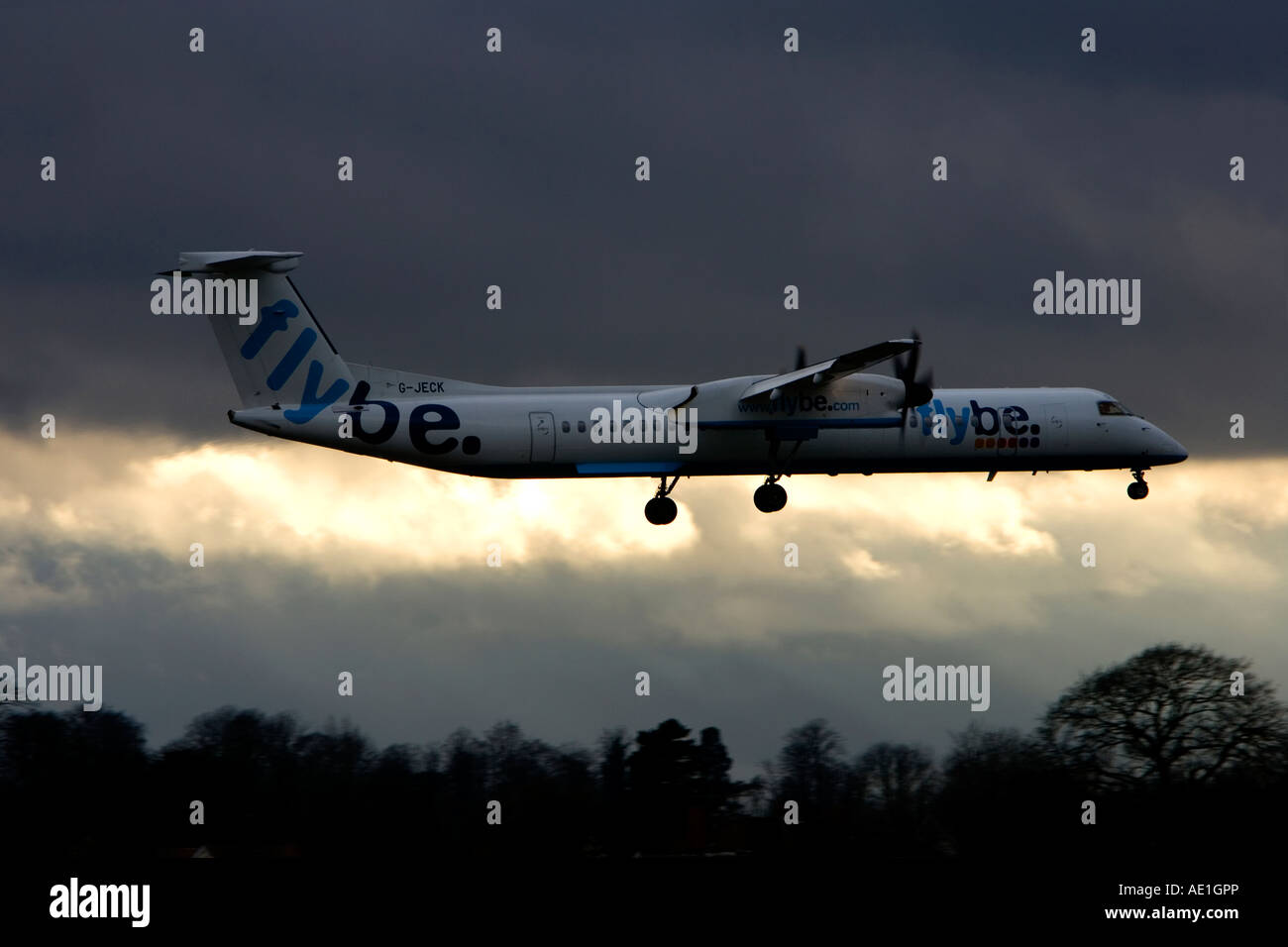 Aeroplane commercial passenger civil aviation Flybe British European Dash 8 at Birmingham airport Stock Photo