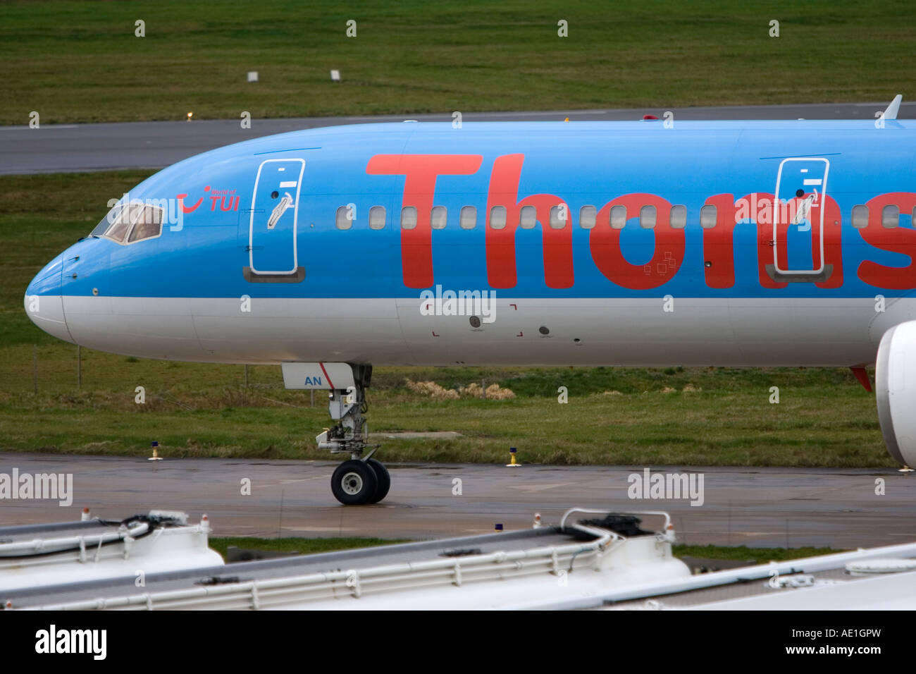 Aeroplane commercial passenger civil aviation Thomsonfly Boeing 757 at Birmingham airport Stock Photo