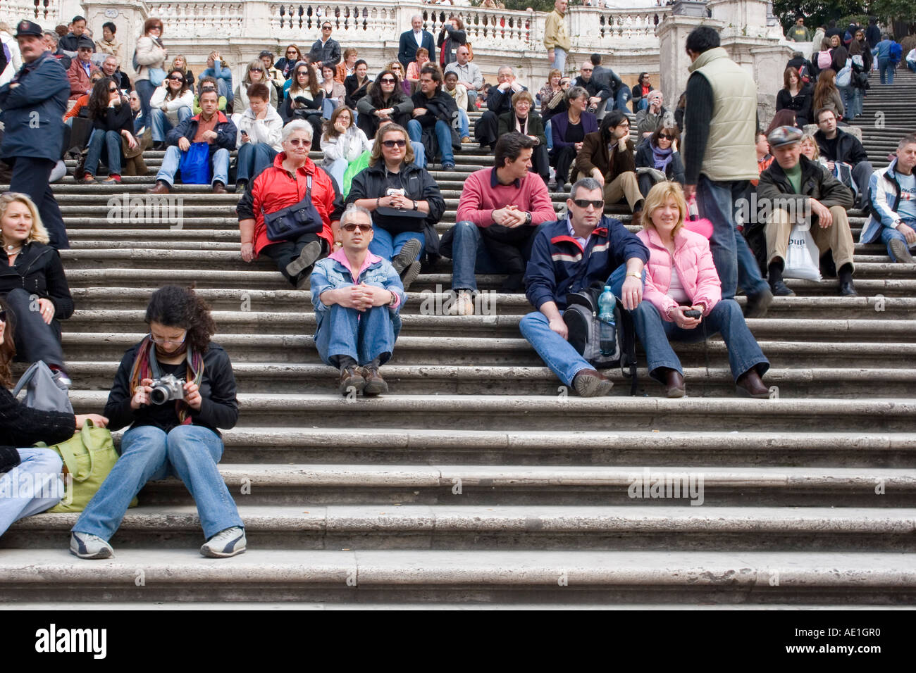 Tourists sitting on Spanish Steps Rome Italy Stock Photo
