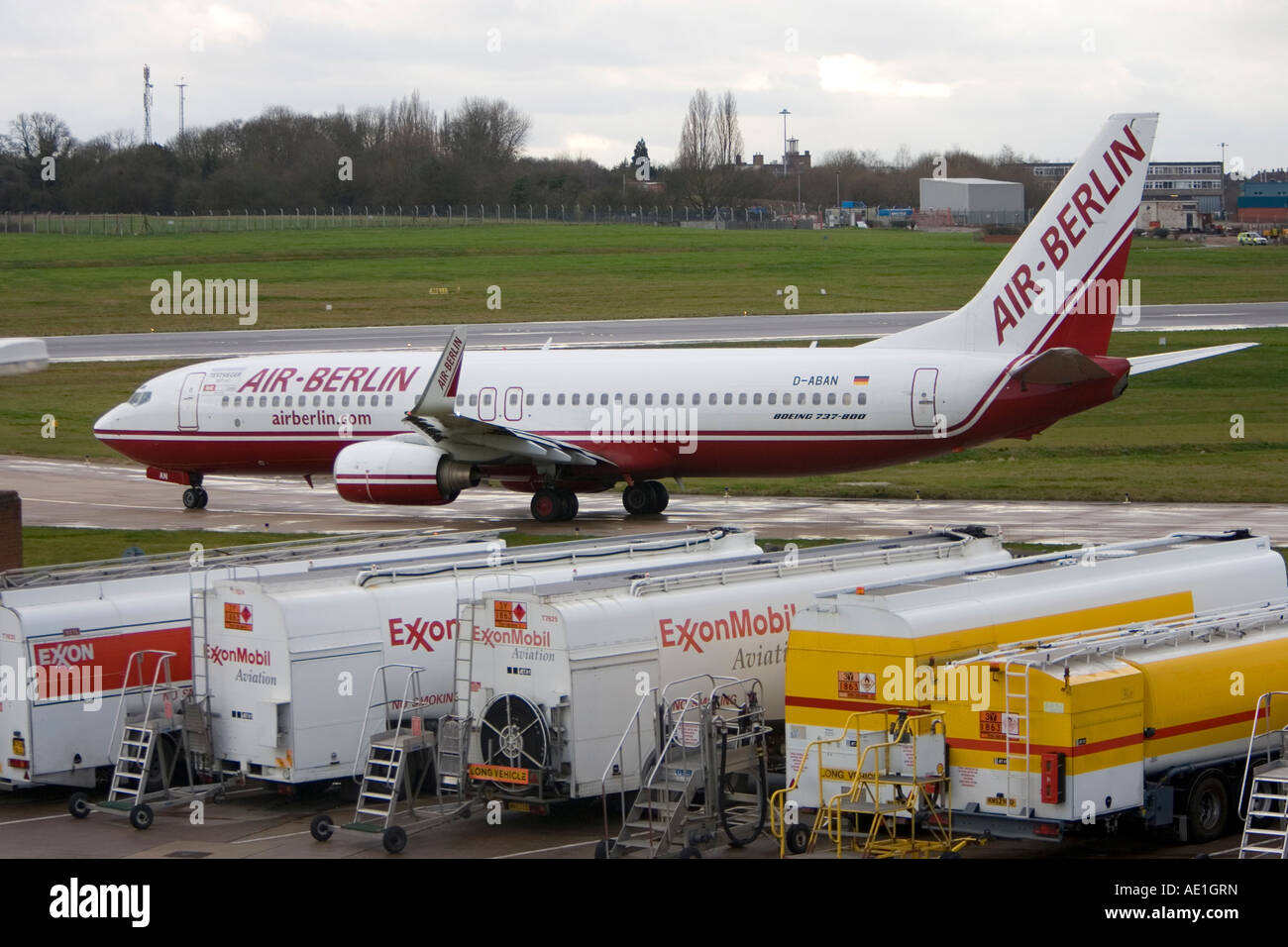 Aeroplane commercial passenger civil aviation Air Berlin Boeing 737 at Birmingham airport Stock Photo