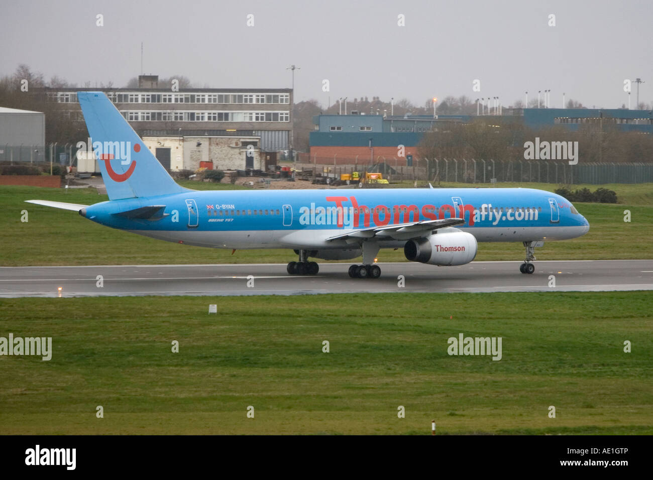 Aeroplane commercial passenger civil aviation Thompsonfly Boeing 757 at Birmingham airport Stock Photo