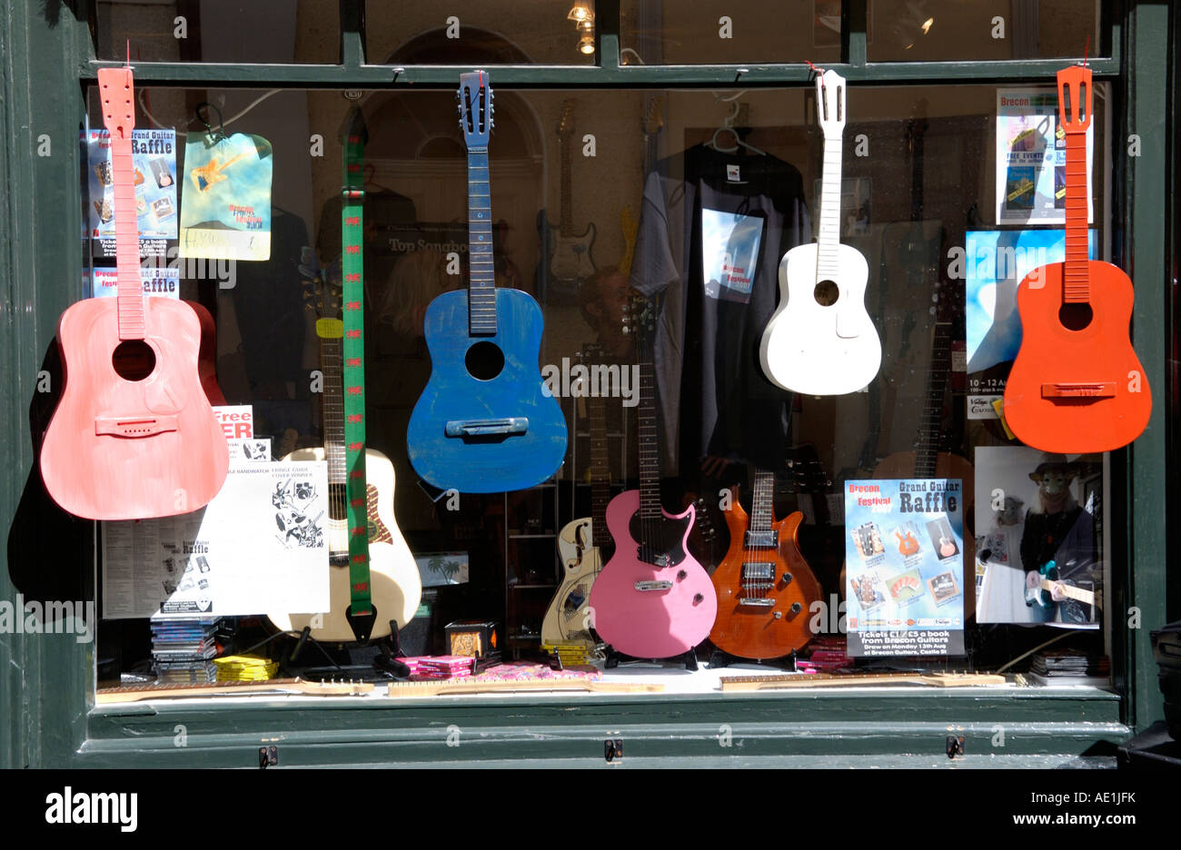 Window display of guitar shop in Brecon town centre Powys Wales UK GB EU Stock Photo