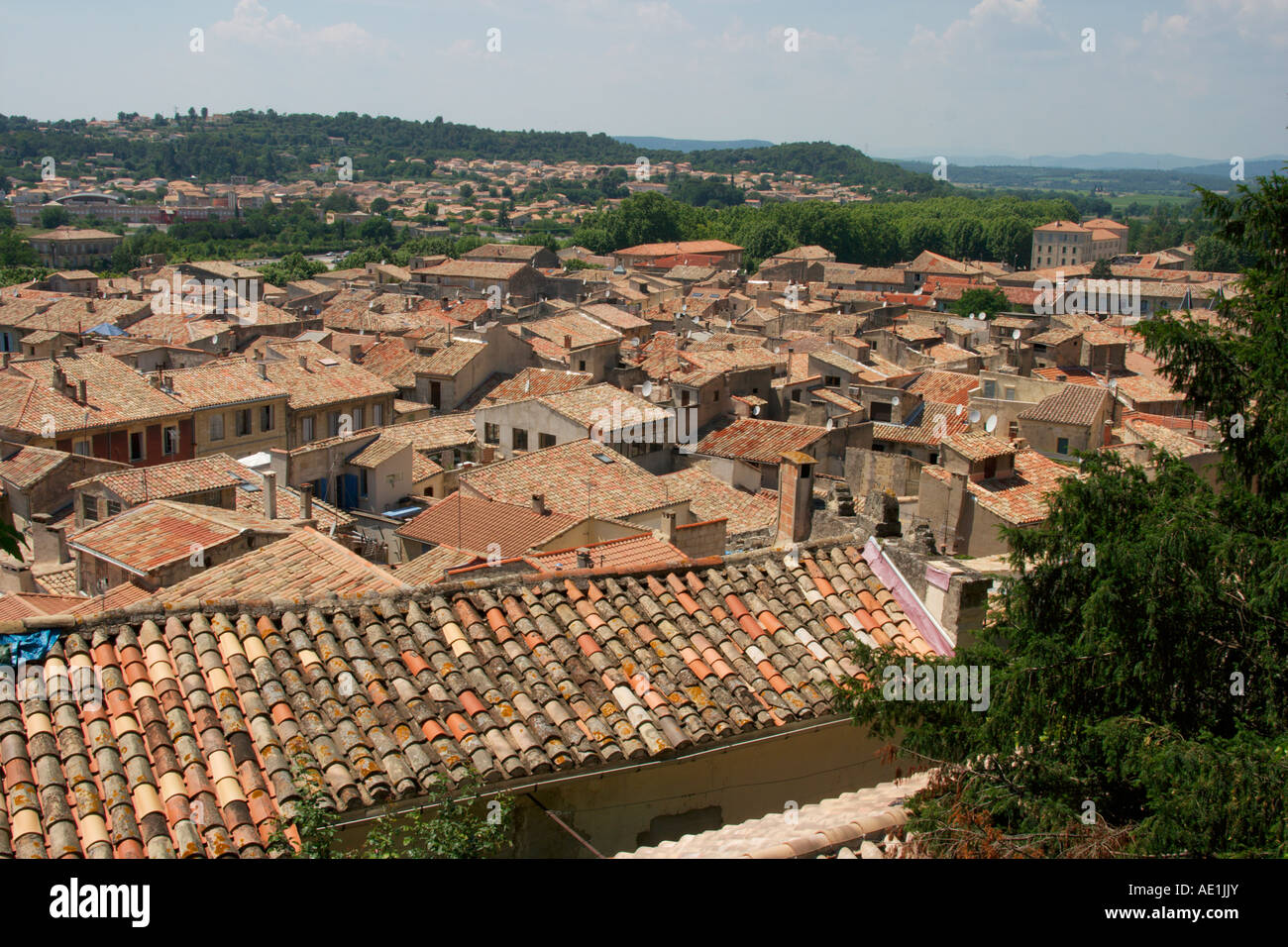 A view over the rooftops of Sommieres in the Gard Languedoc Roussillon. The South of France. Stock Photo