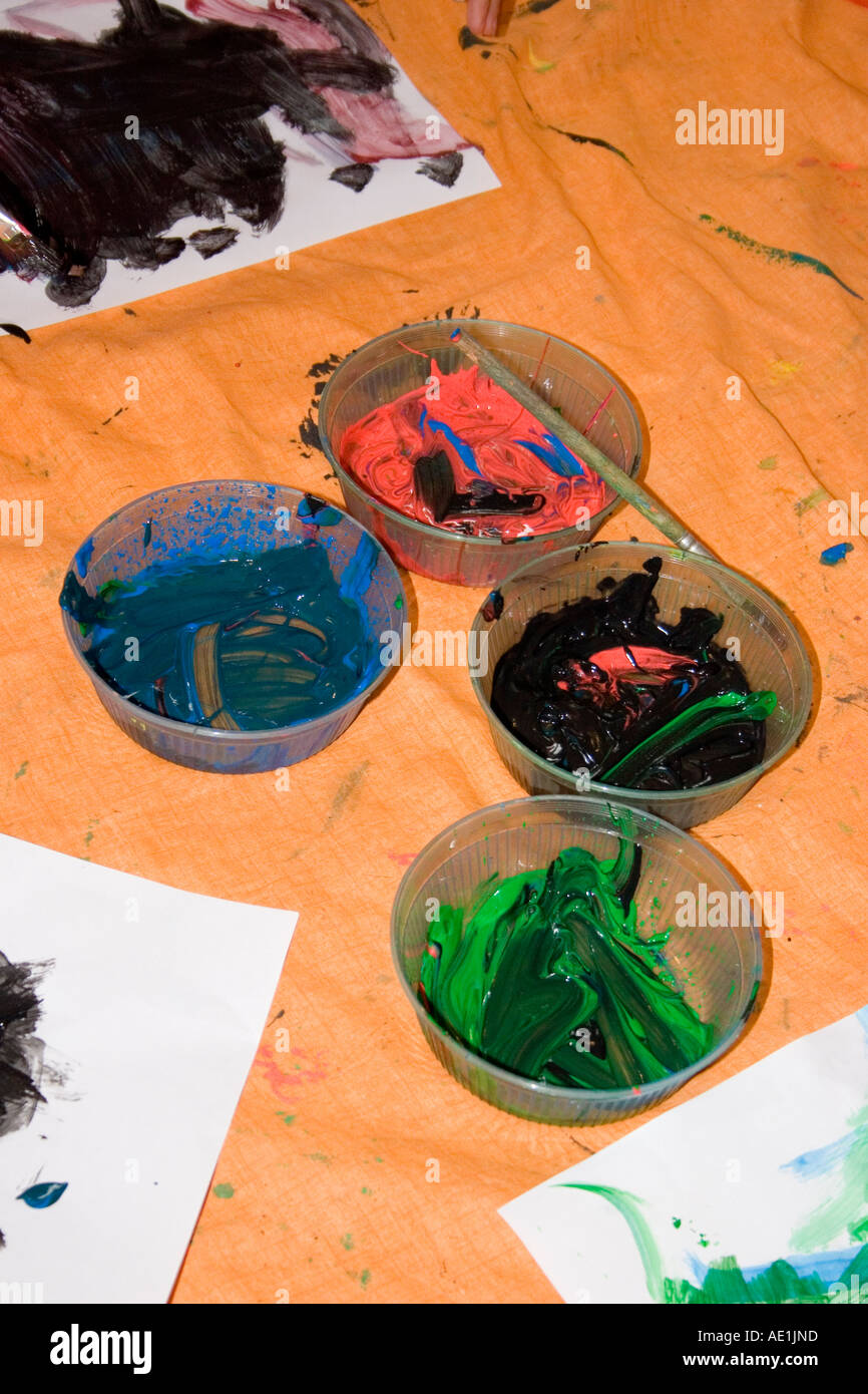 Paint pots at play school Stock Photo Alamy
