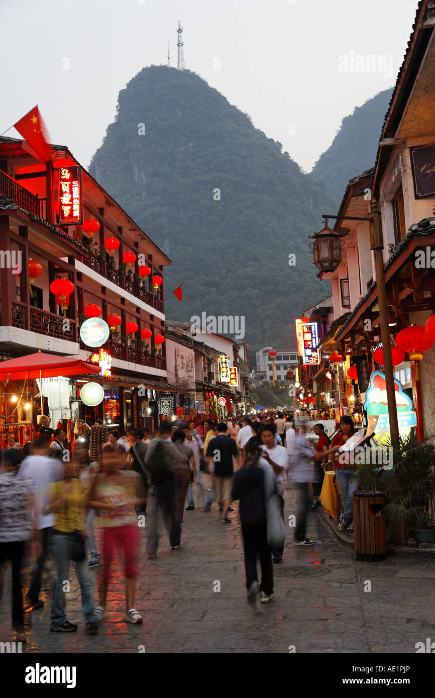 West Street in Yangshuo at dusk Guanxi China Stock Photo