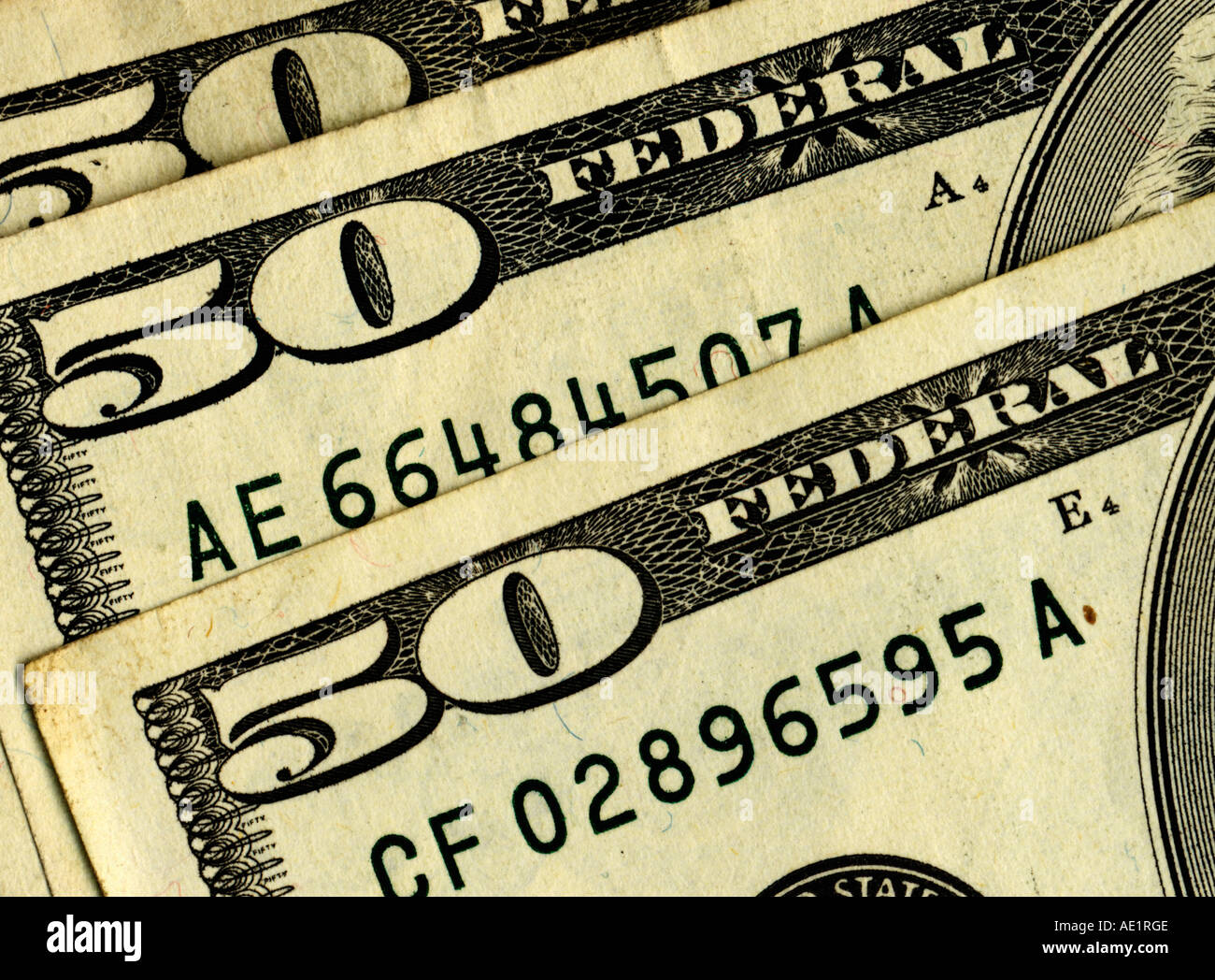 extreme closeup view of portion of three 50 dollar bills US Stock Photo