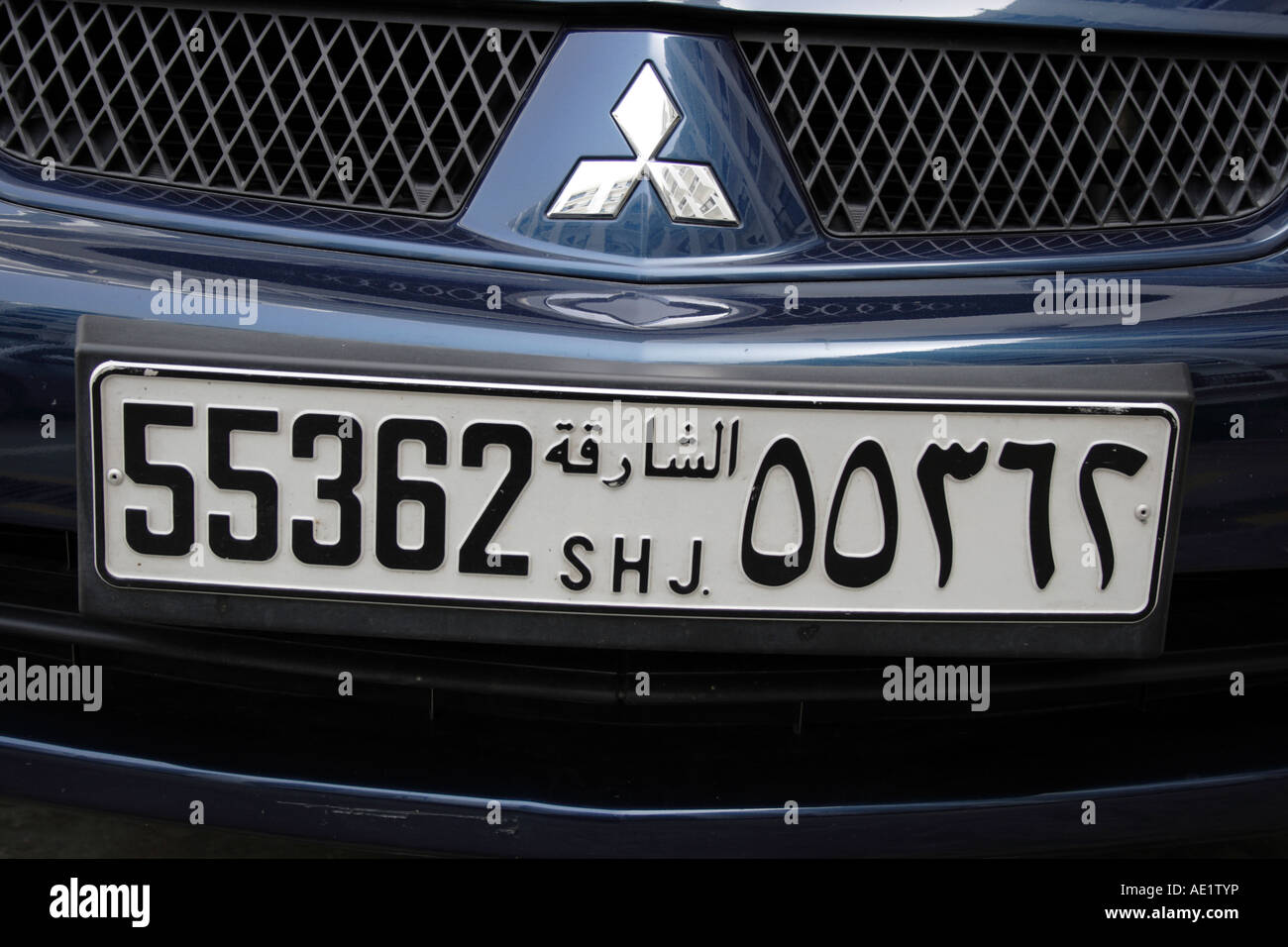 front of a Mitsubishi with car license plate of Sharjah in Dubai, United Arab Emirates. Photo by Willy Matheisl Stock Photo