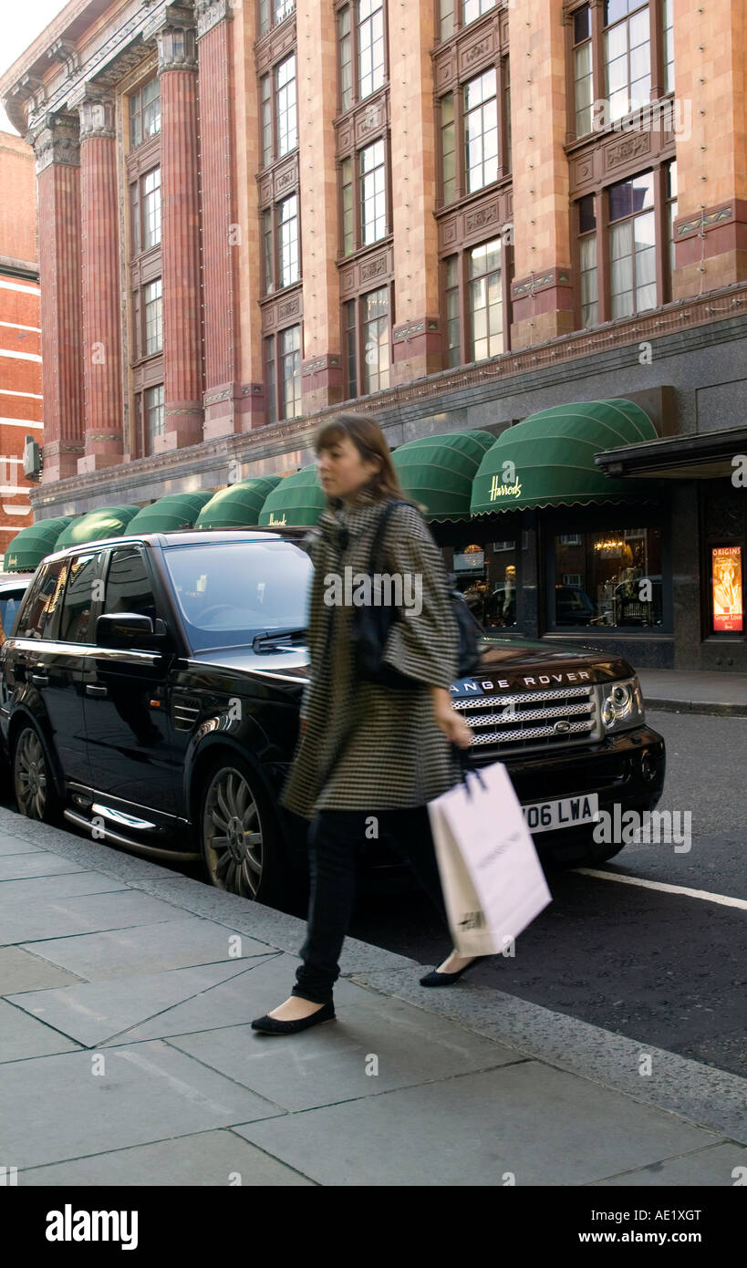 Woman Shopper with Range Rover parked outside Harrods London UK 2006 ...