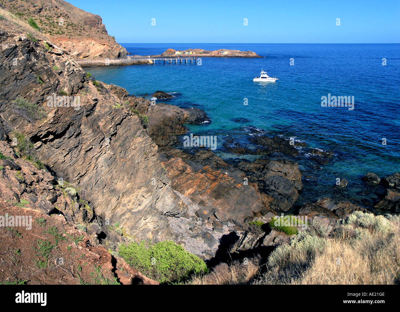 Second Valley Jetty fishing sea boat rocks cliffs Stock Photo Alamy