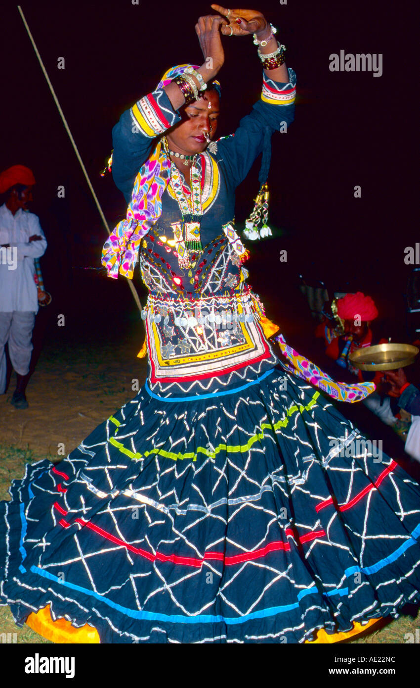 India Rajasthan Pushkar dancing tribeswoman Stock Photo