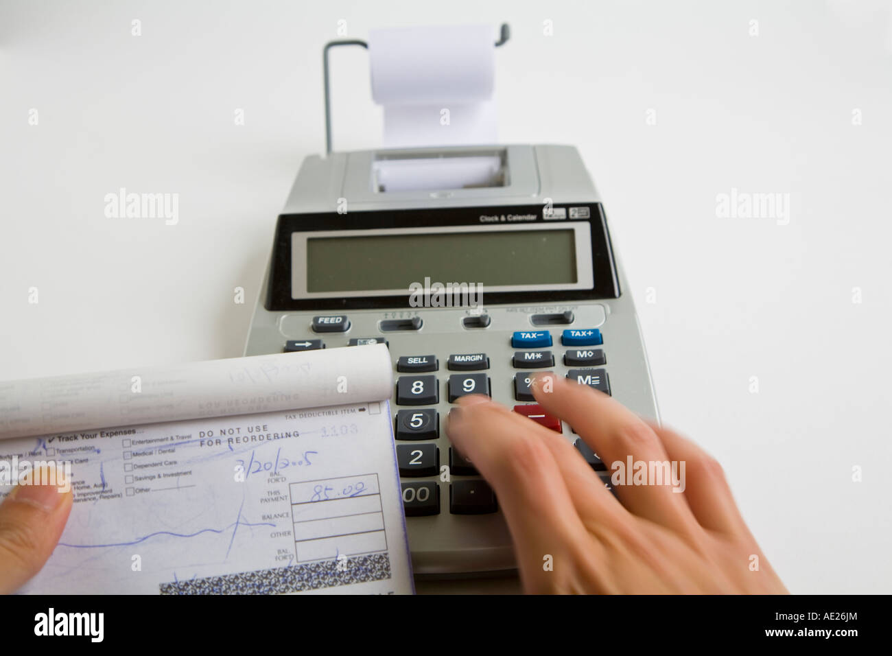 Handheld Calculator and Checkbook Stock Photo Alamy