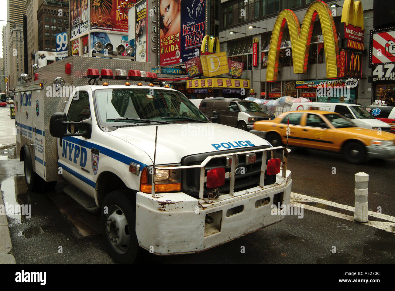 new york usa us america american police ford truck in time square new york city macdonalds taxi cab busy city times Stock Photo