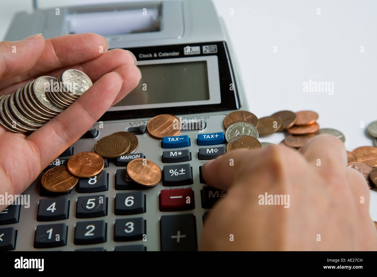 Counting Changes with Calculator Stock Photo Alamy