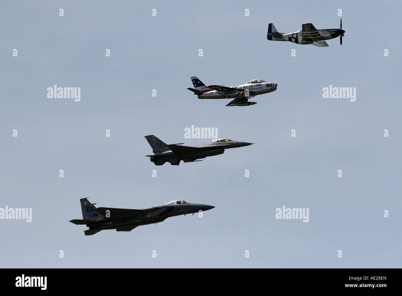 A Mustang P-51, F-86F Sabre Jet, F-16 Falcon F-15 Strike Eagle Perform the Heritage Flight Stock Photo