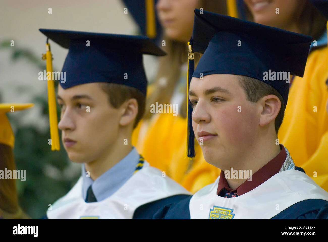 Cap and gown Commencement high school graduation ceremonies at Port Huron Northern High School in Port Huron Michigan Stock Photo