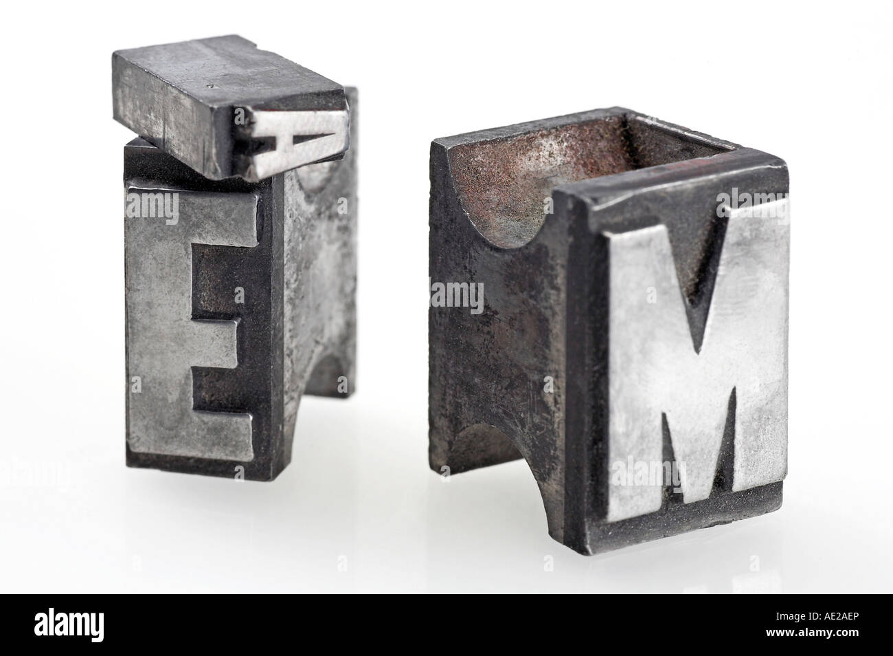 Lead letters on white background Stock Photo - Alamy