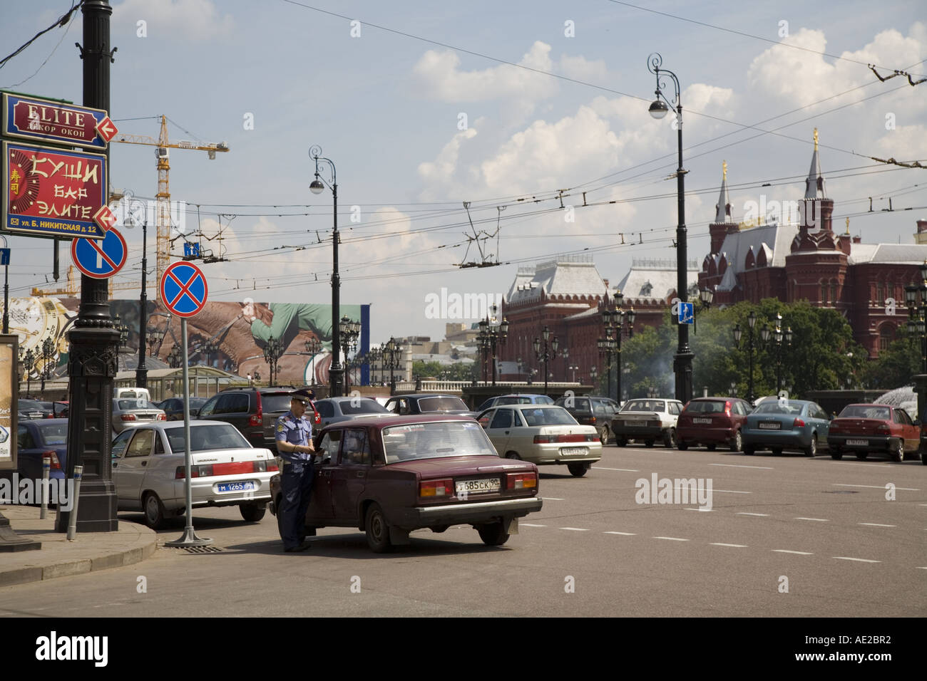 Advertising posters old and new cars on Mokhovaja opposite the Kremlin Moscow Russia Stock Photo