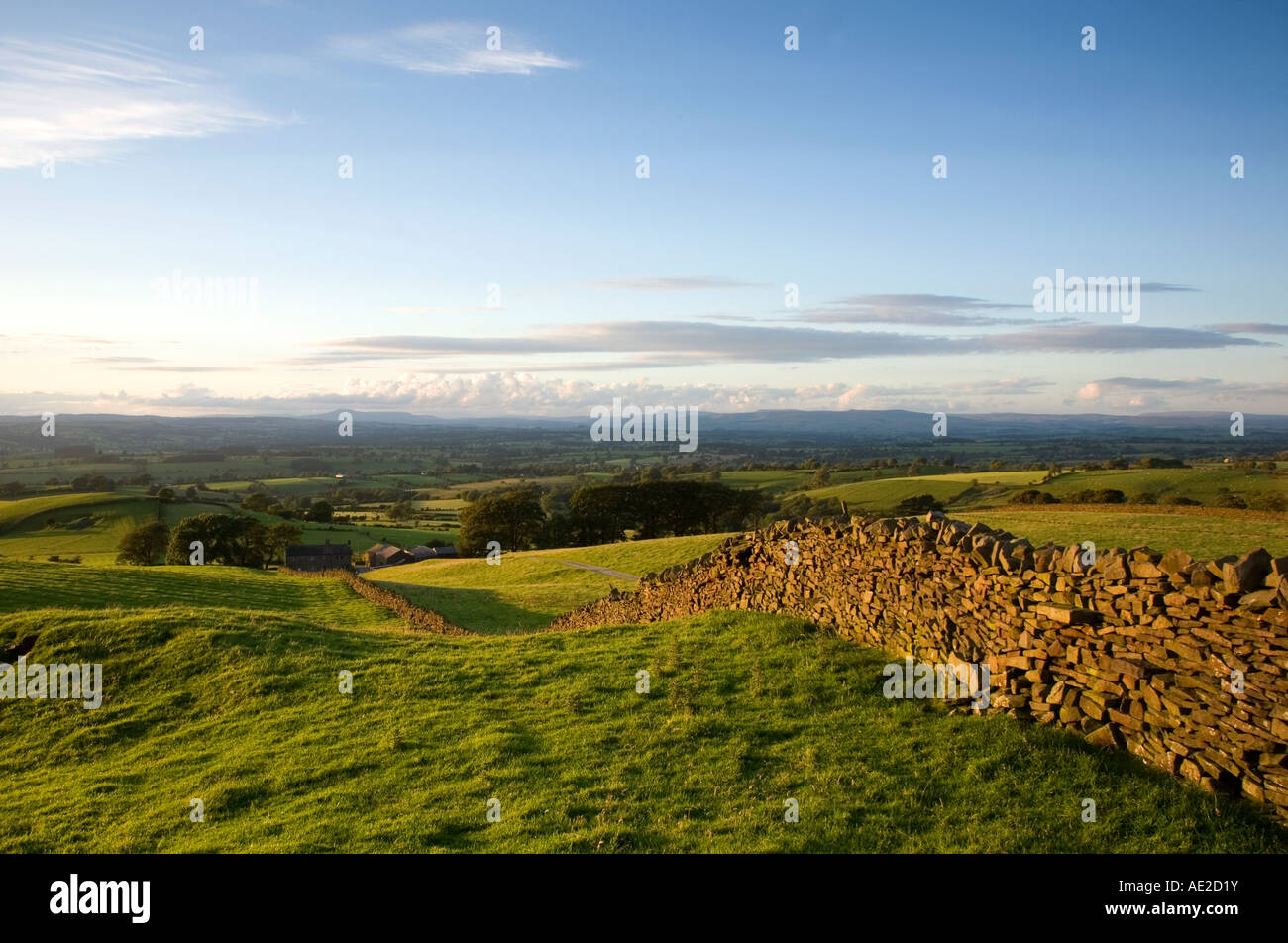 Ribble valley from Pendle Hill, Lancashire. Fields with dry stone wall used in UK Agriculture stock fences. From Pendle hill Stock Photo