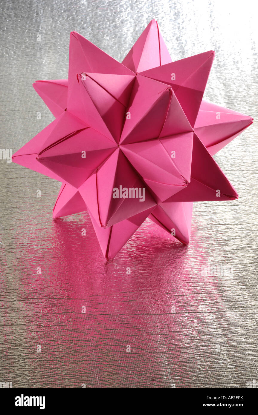 Origami abstract paper figure polyhedron Stock Photo - Alamy