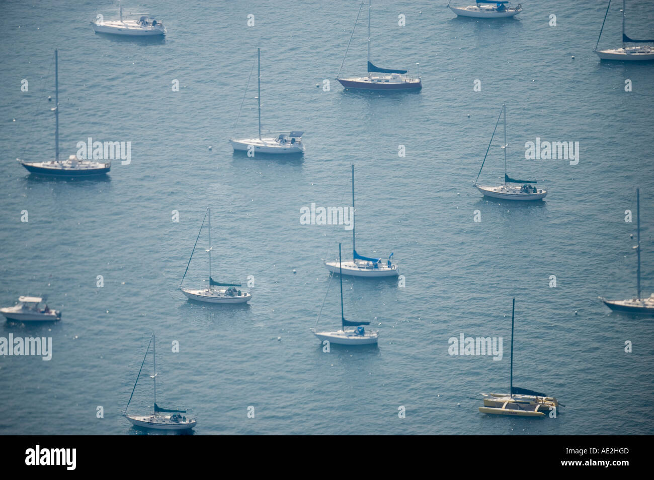 Sailboats docked in a harbor Stock Photo - Alamy