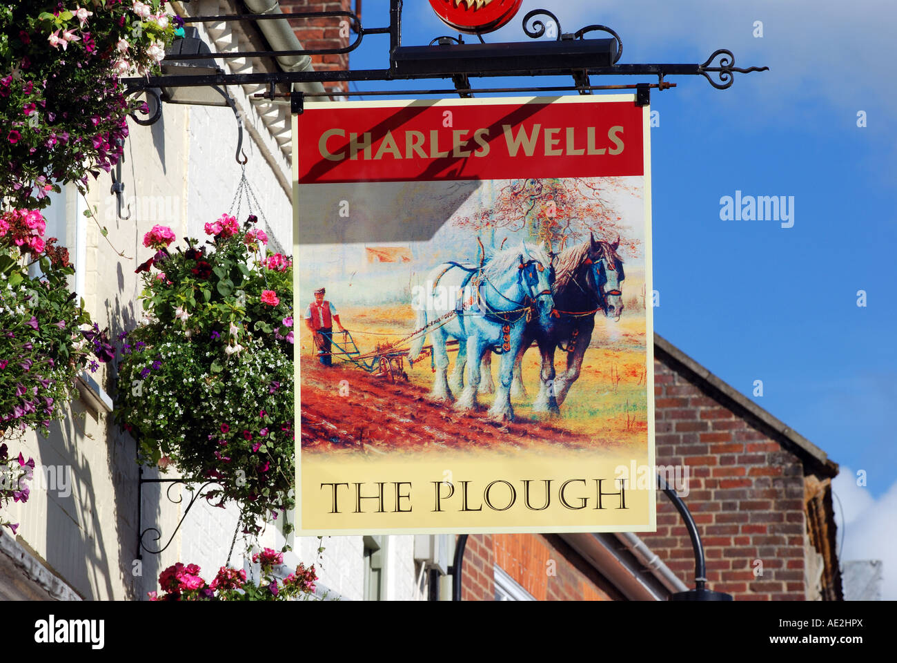 The Plough pub sign, Towcester, Northamptonshire, England, UK Stock Photo