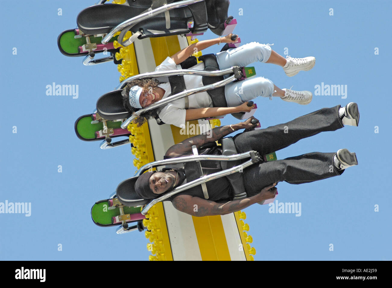 Kids having fun on fairground rides hi-res stock photography and images ...