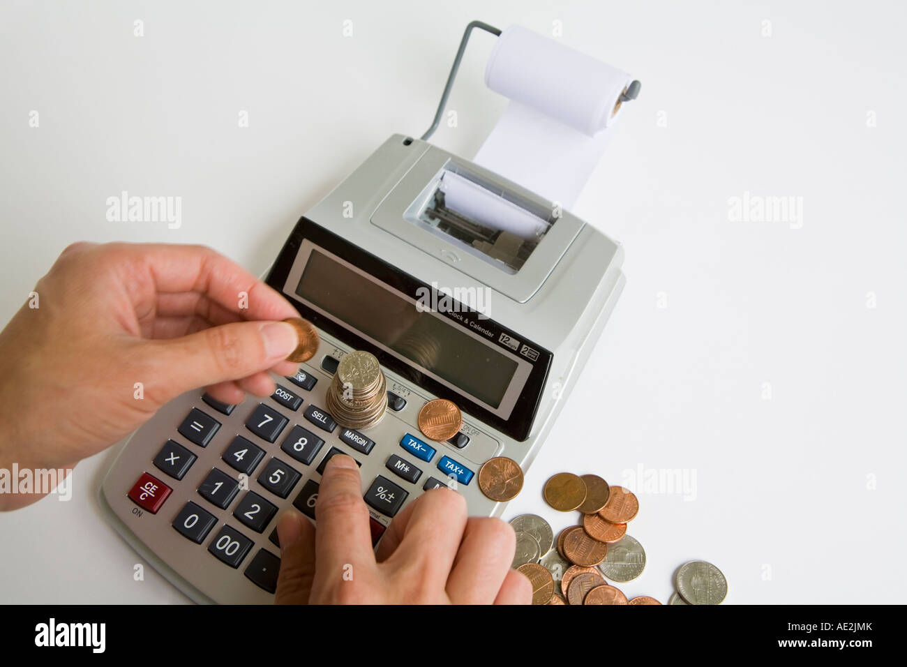 Counting Changes with Calculator Stock Photo Alamy