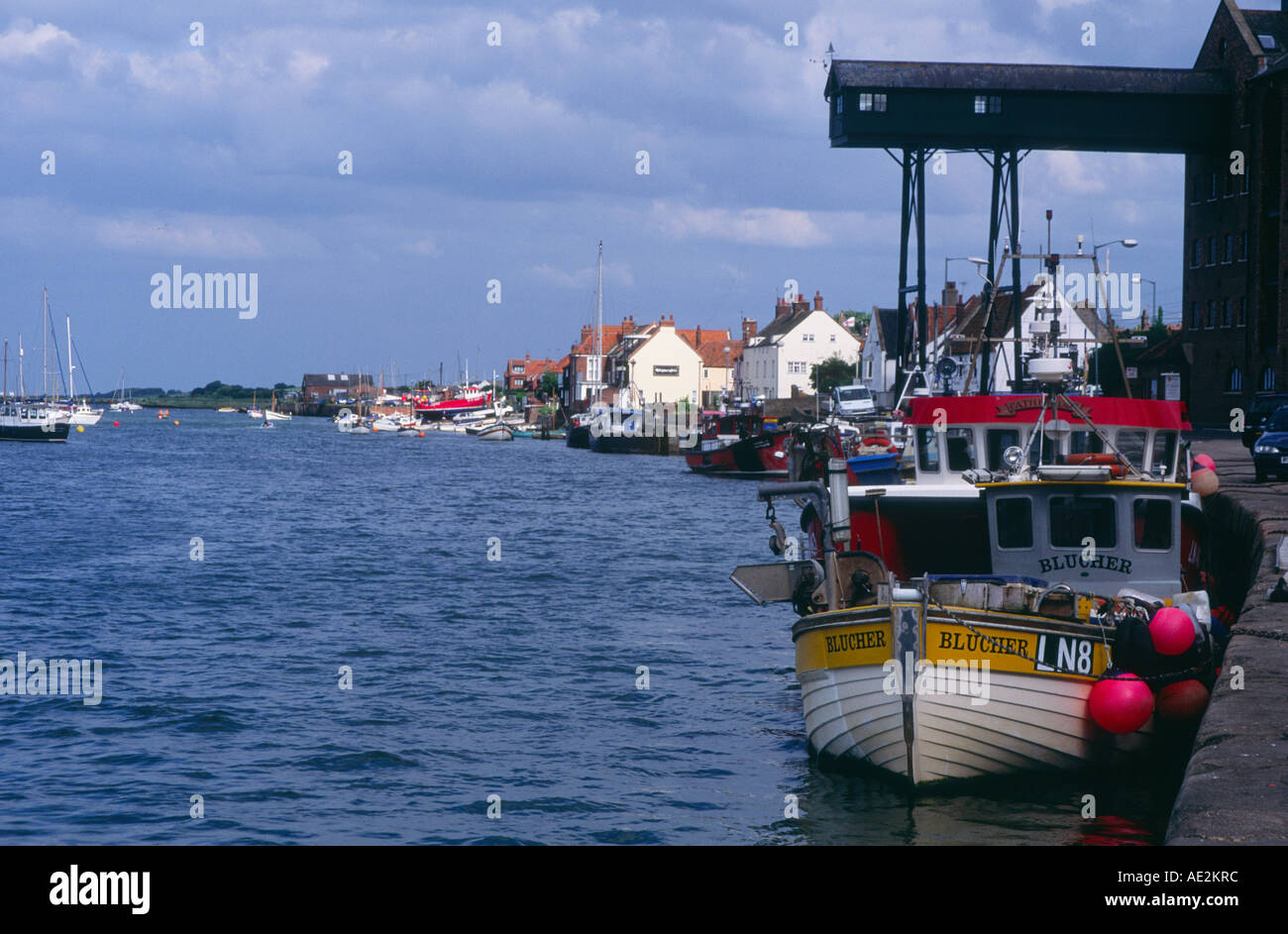 Boats and quayside Wells - next- the -sea, Norfolk, England Stock Photo