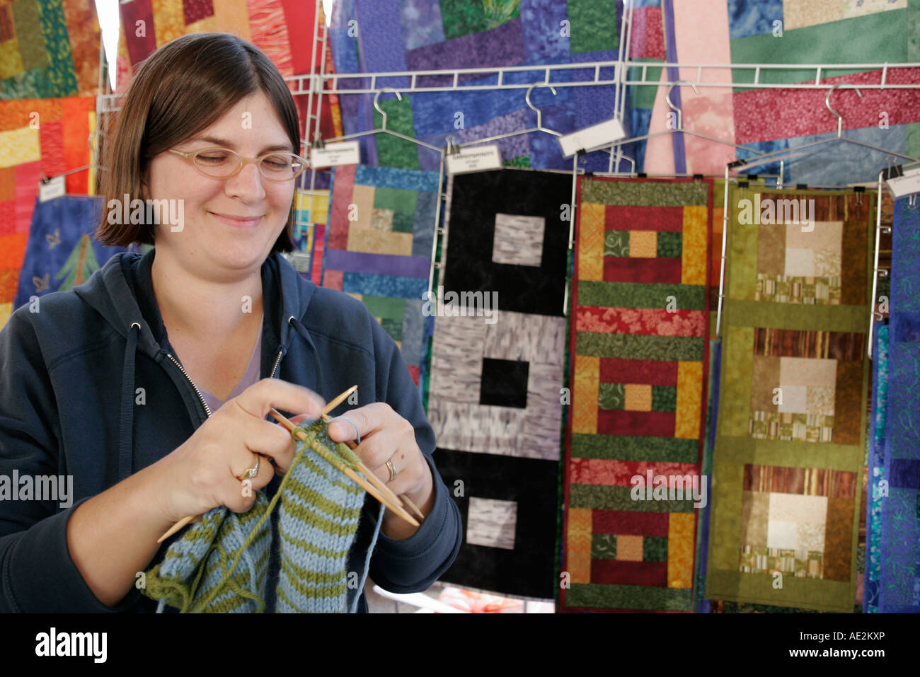 Ann Arbor Michigan,Kerrytown historic Market District,farmers market,quilts,knitting,woman female women,MI070721039 Stock Photo