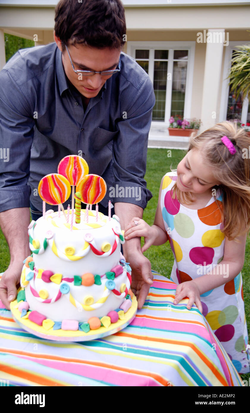 Man holding party cake Stock Photo