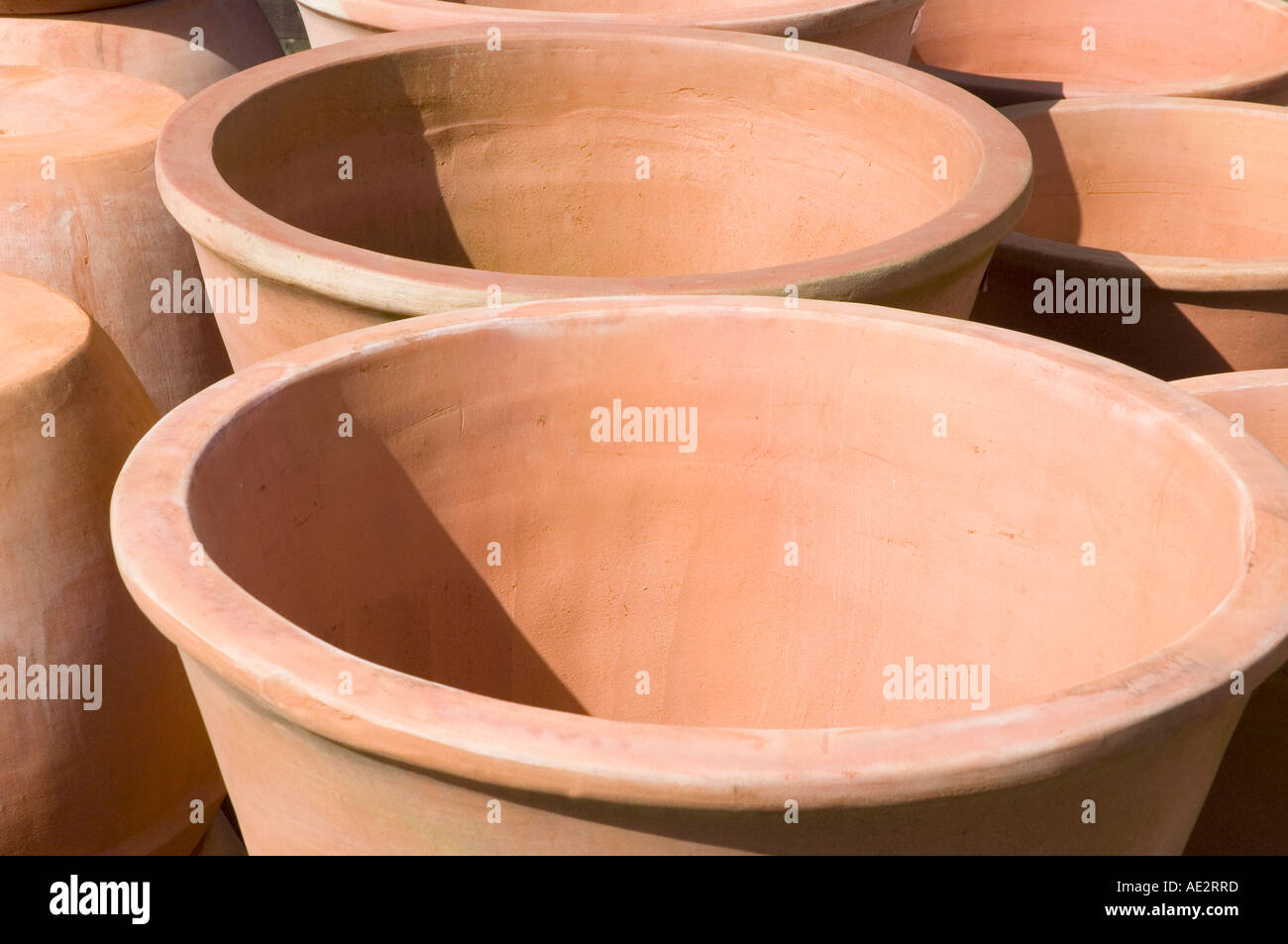 Tera cota or terracotta pots in bright sunshine Stock Photo
