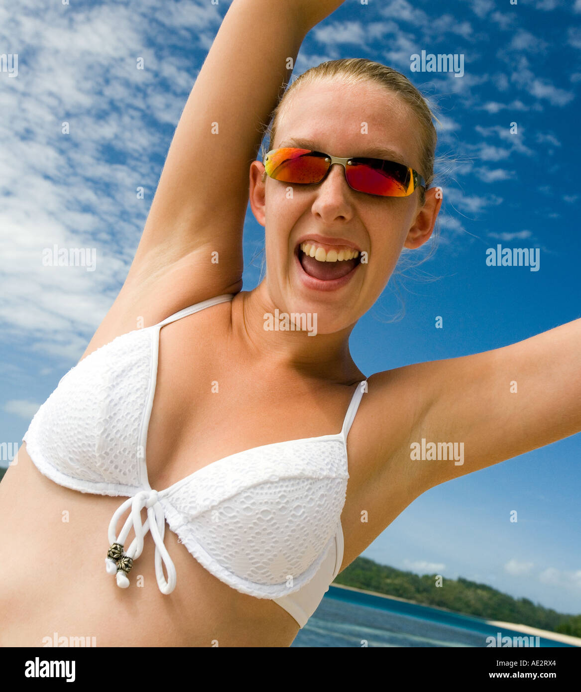 Girl in a bikini on a tropical beach in French Polynesia in the South  Pacific Stock Photo - Alamy