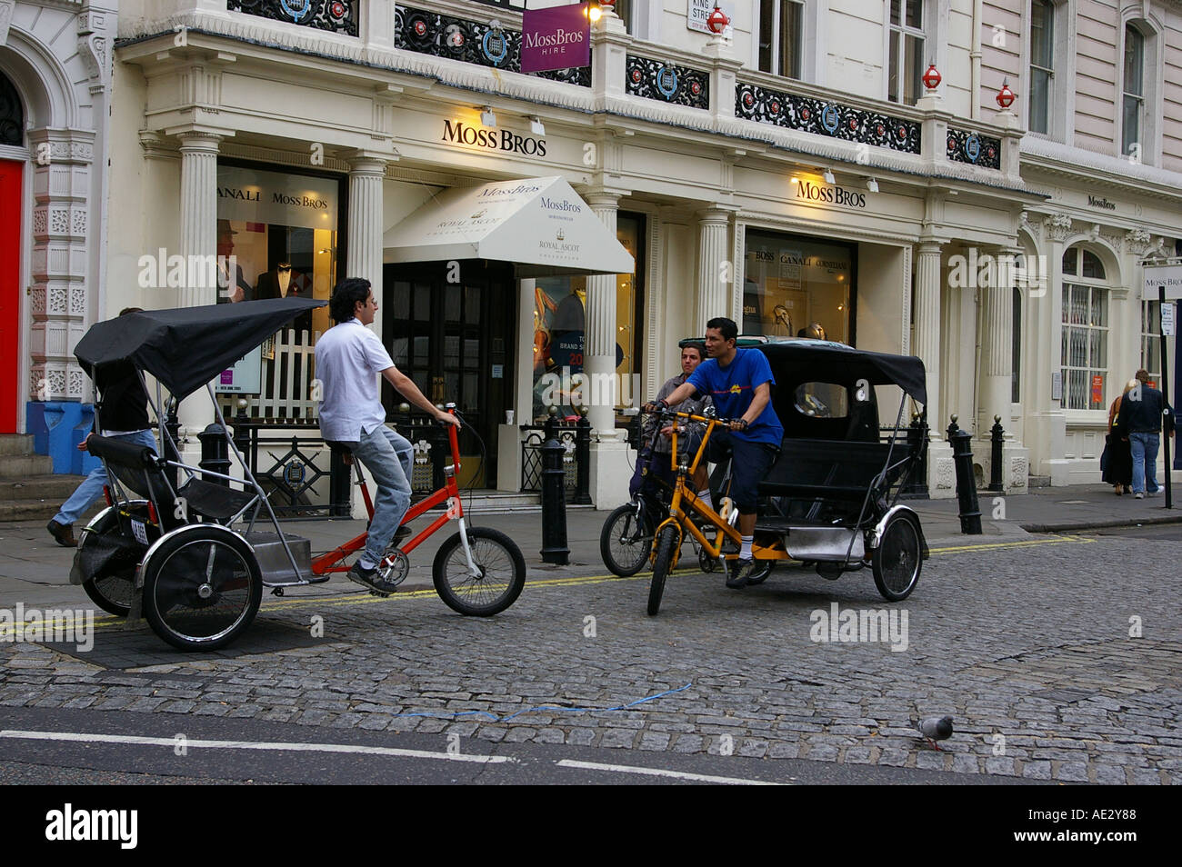 London rickshaw taxi carriage tourist fashion trend popular Stock Photo