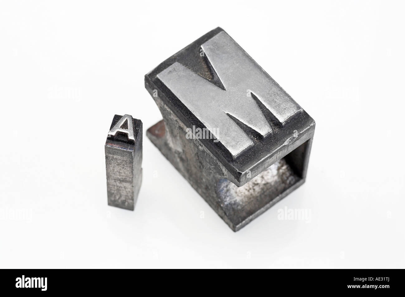 Lead letters on white background Stock Photo - Alamy