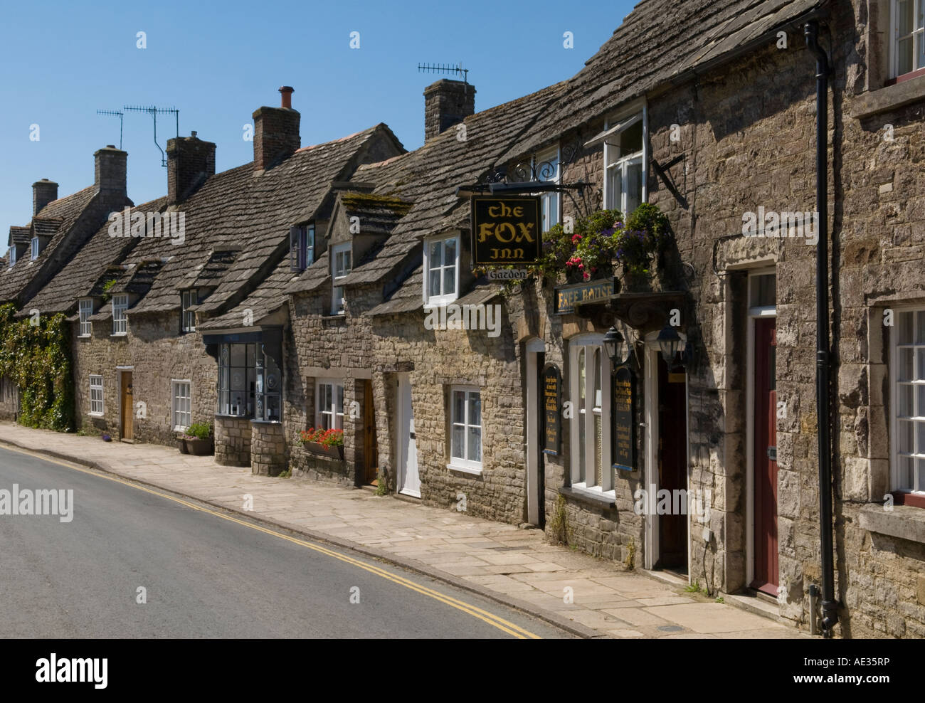 Row of cottages in Corfe Castle village, Dorset, UK Stock Photo Alamy