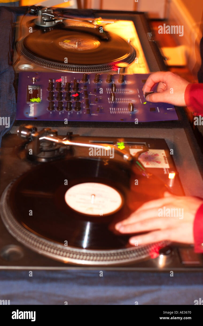 DJ at the turntables Stock Photo Alamy