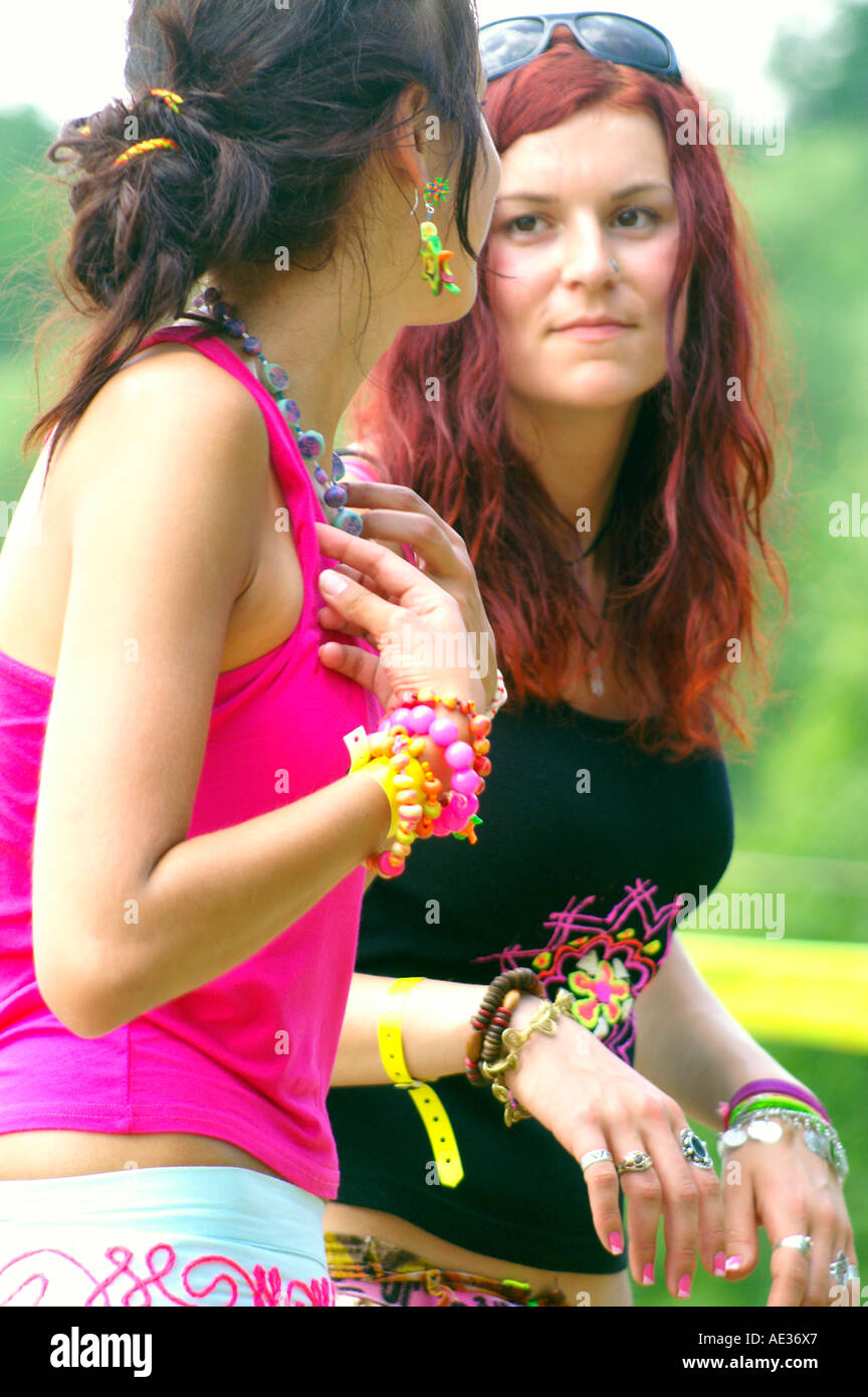 Hilltop 2006 - Two pretty girls dancing at rave party outdoors ...