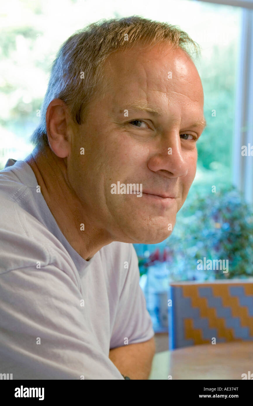 Caucasian male (49) smiling Stock Photo Alamy