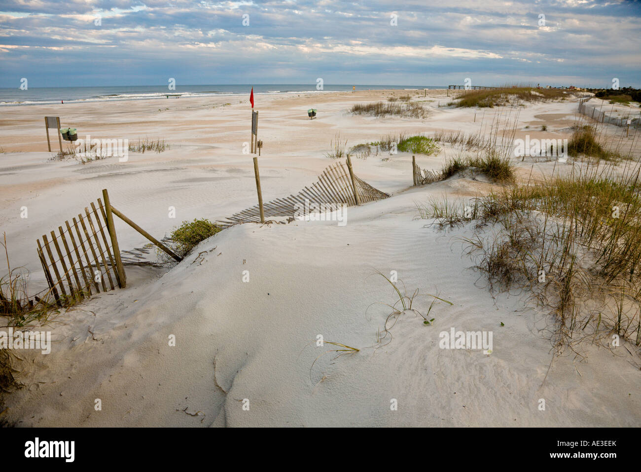 Wooden erosion fence on sand beach at Anastasia State Park, in St
