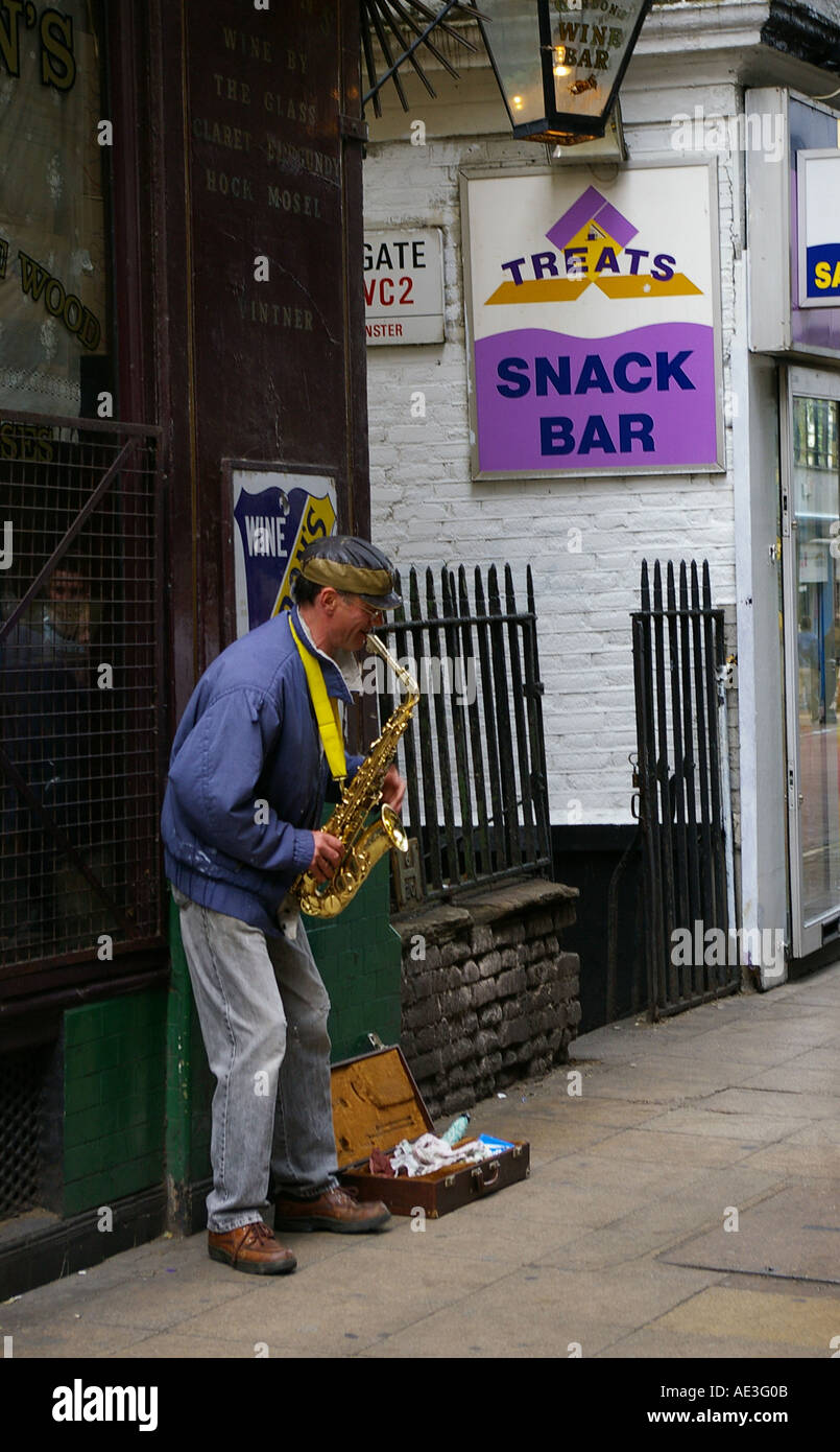 London busker jazz saxophone Charing Cross street musician Stock Photo