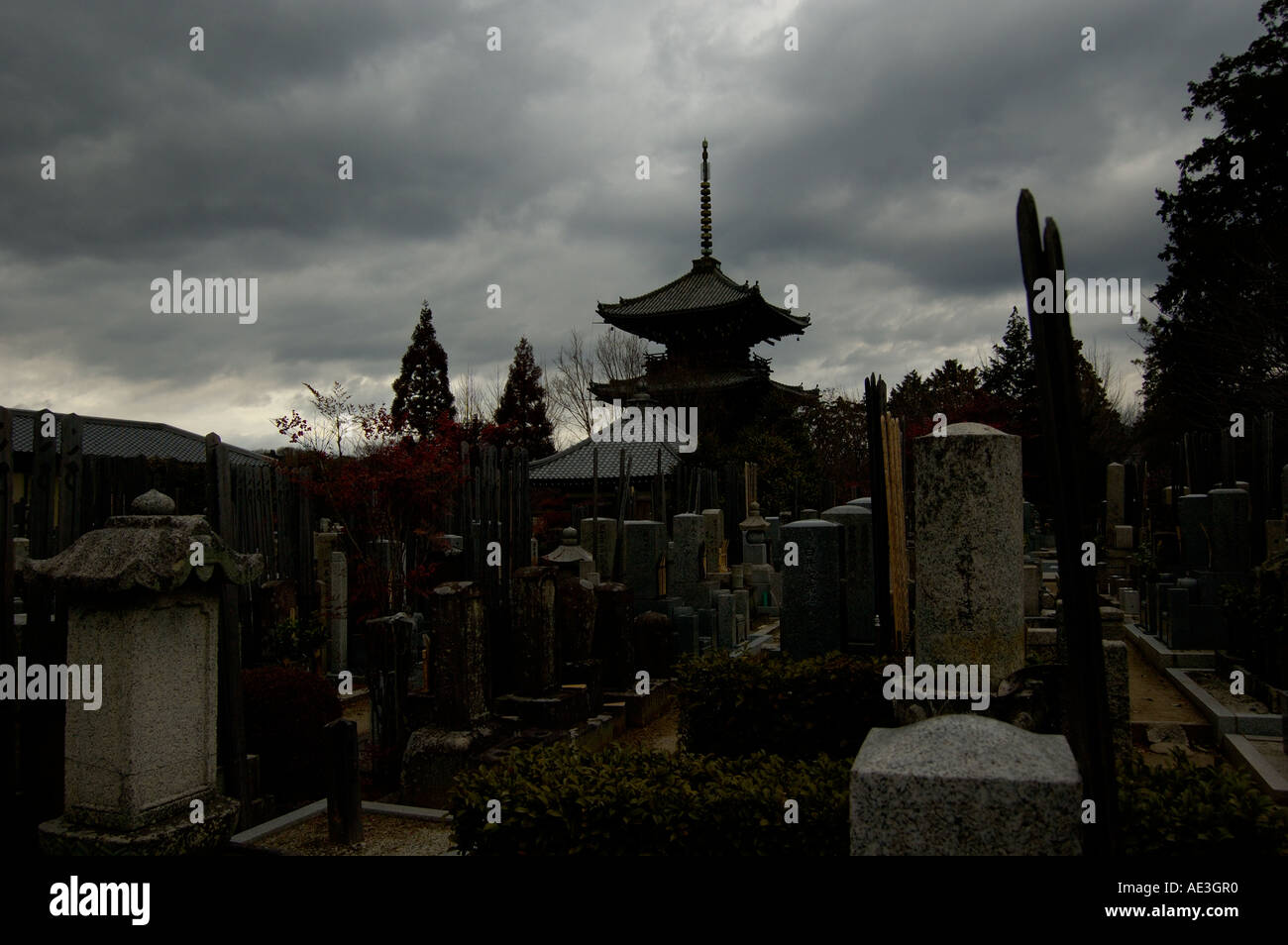 A pagoda and graveyard Yoshidayama area Kyoto Japan Stock Photo