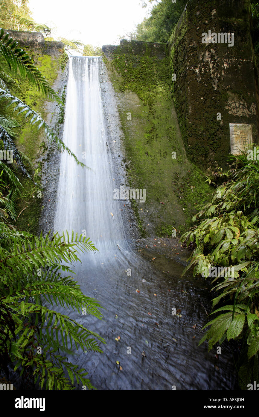 Water flowing down side of old reservoir, New Zealand Stock Photo - Alamy