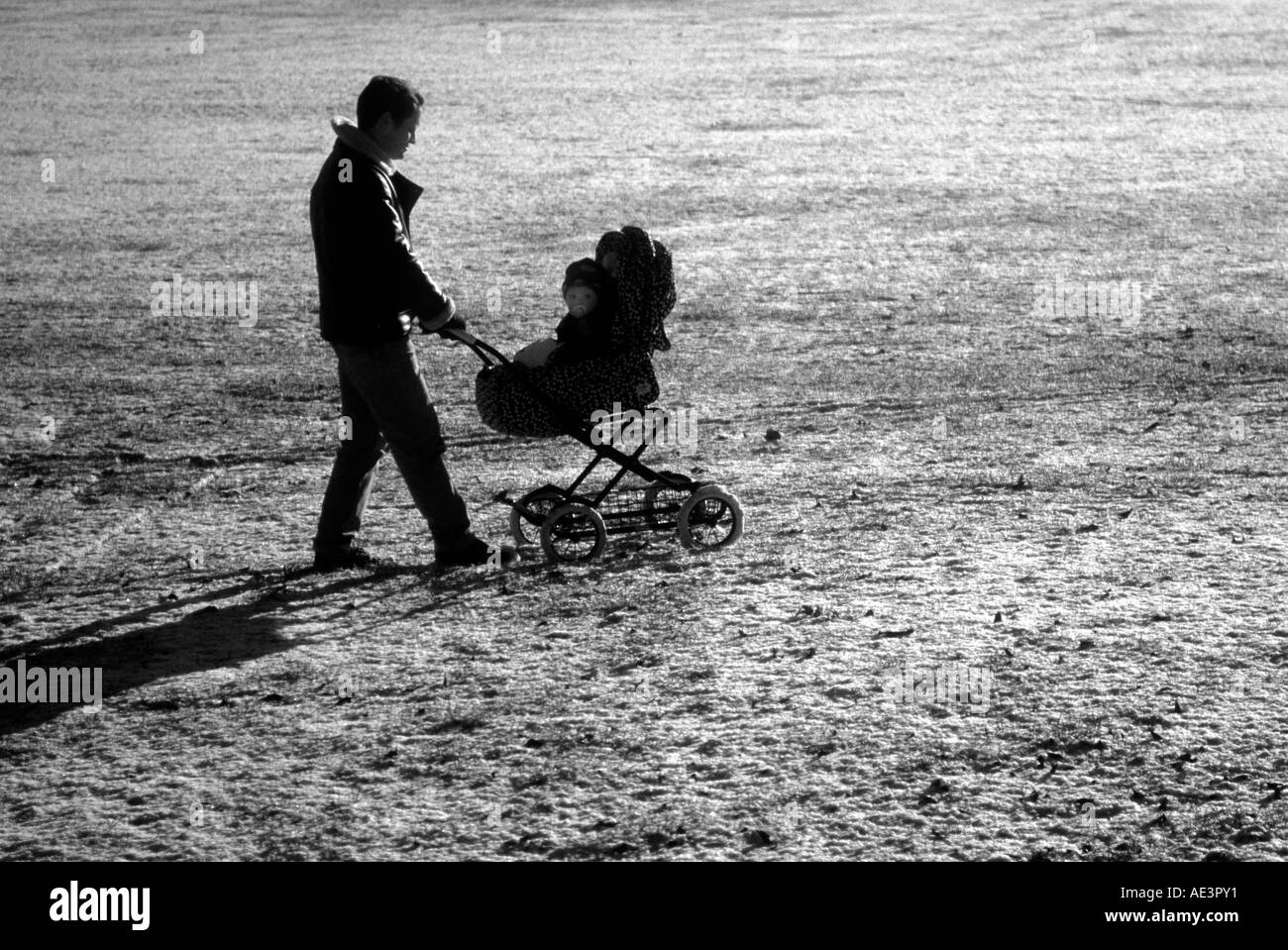 Man Pushing A Pram Stock Photo