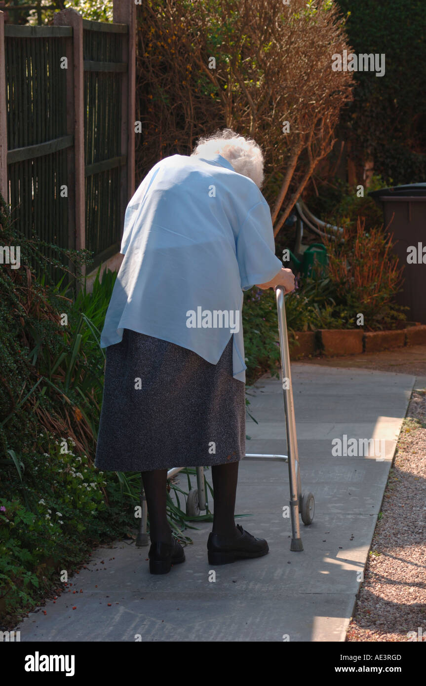 Old lady walking hi-res stock photography and images - Alamy