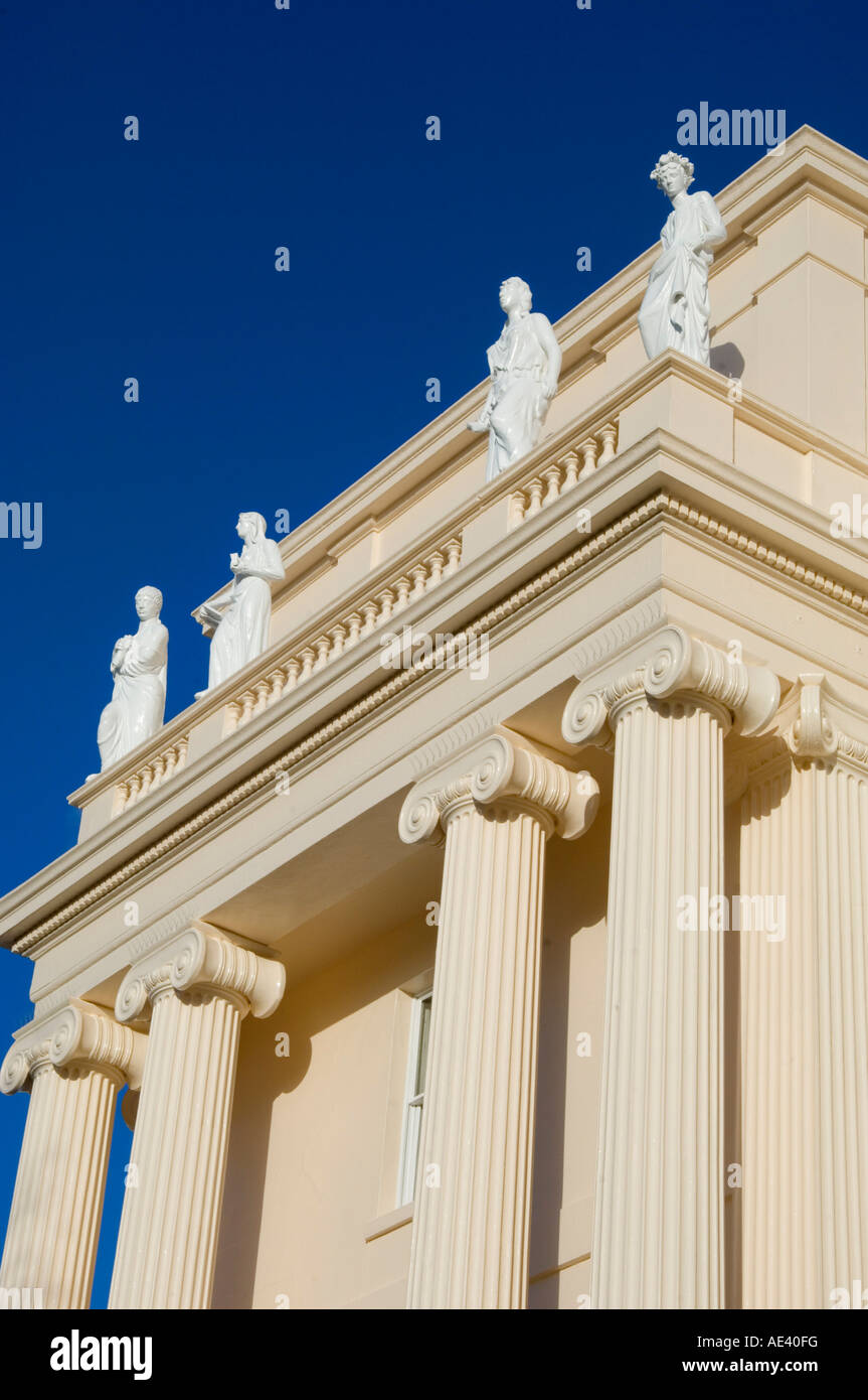 Pillars and statues on cream coloured John Nash designed building