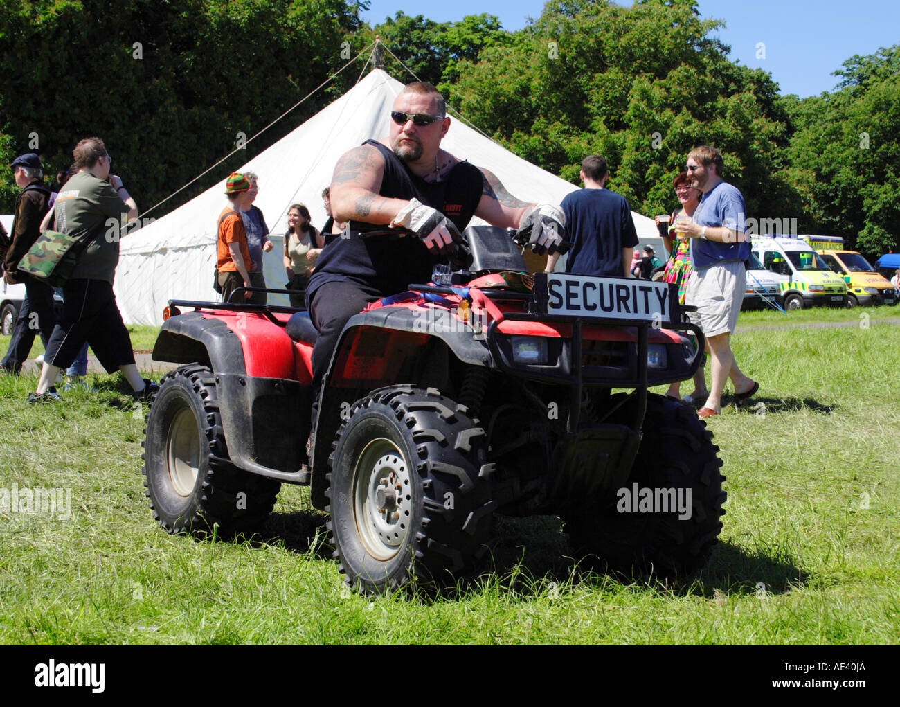Security Guard on a Quad Bike Stock Photo Alamy