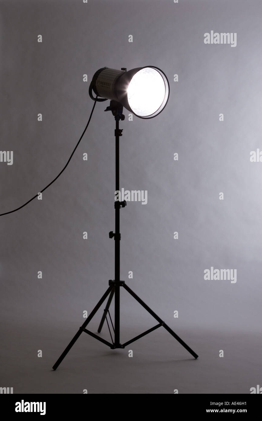 A photographic studio flash lighting head and reflector Stock Photo