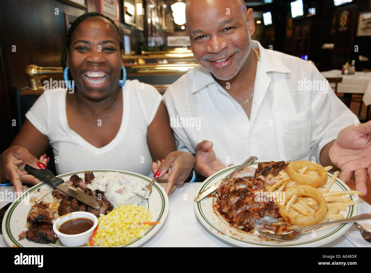 Cincinnati Ohio,McFadden's Restaurant and Saloon,Black Blacks African Africans ethnic minority,couple,adult adults man men male,woman women female lad Stock Photo