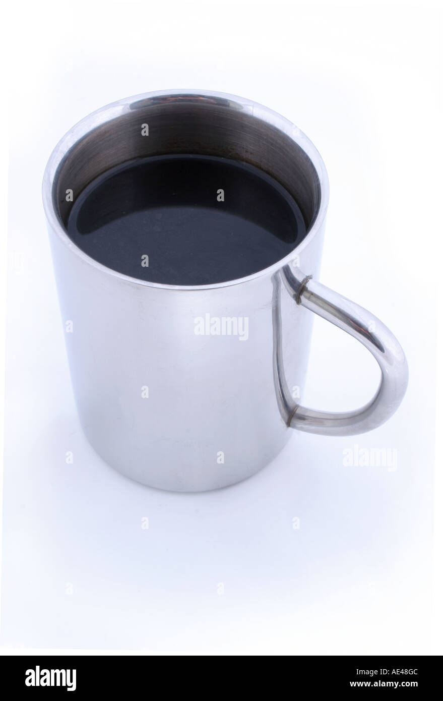Mug of black coffee on a white background. Stock Photo